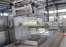 泡椒凤爪全自动称重连续式真空包装机
